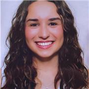 Apasionada, paciente y creativa, enseñando a niños de primaria.